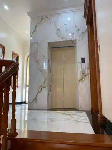 Báo Giá Đá Ốp Thang Máy Mới Nhất 2026: Cập Nhật Đơn Giá & Mẫu Đẹp